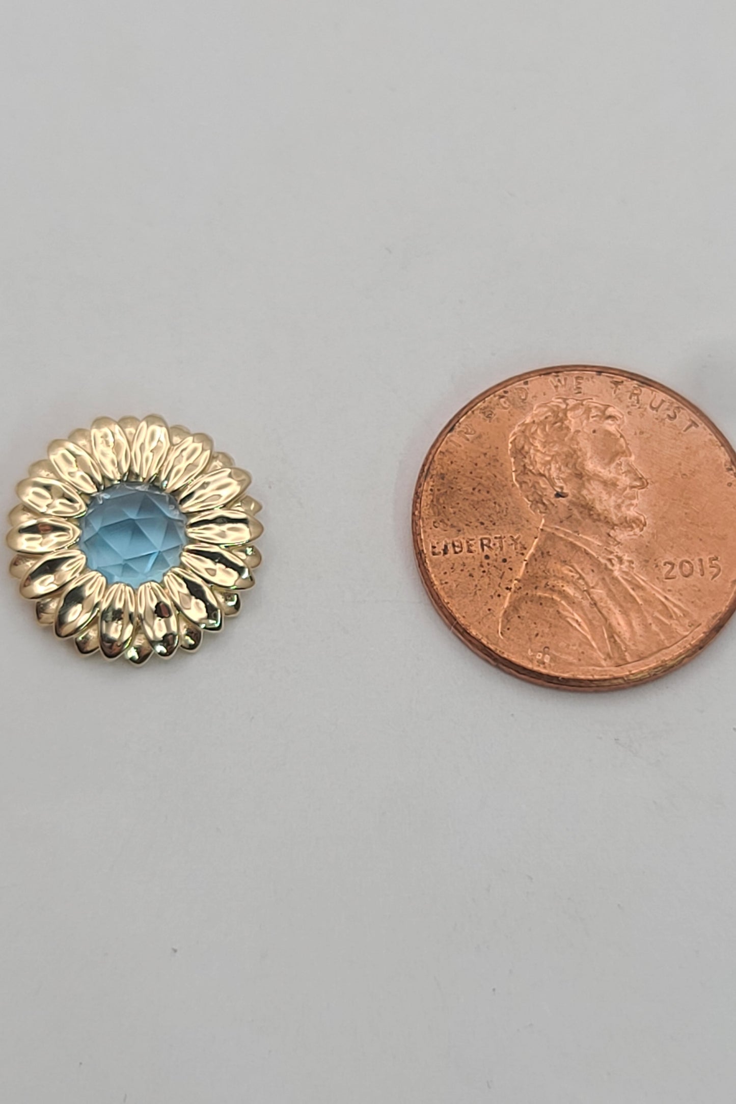 Petite Blue Topaz Sunflower Pendant